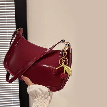 TrenLux Wear Women's Pure Leather Solid Colour Cherry Pendant  Bag TrenLux Wear